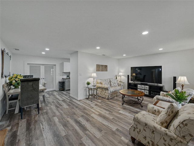 140 Morrow Cir, Brandon, FL 33510 - living room with wood finished floors, recessed lighting, and baseboards