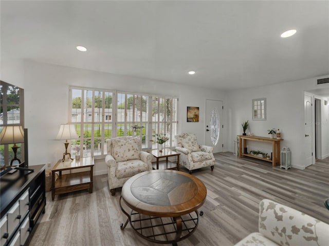 140 Morrow Cir, Brandon, FL 33510 - living room with wood finished floors, recessed lighting, and baseboards