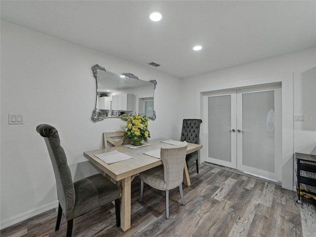 140 Morrow Cir, Brandon, FL 33510 - dining room featuring french doors, wood finished floors, and recessed lighting