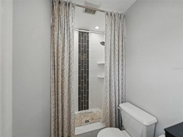 140 Morrow Cir, Brandon, FL 33510 - full bathroom featuring toilet and a tile shower