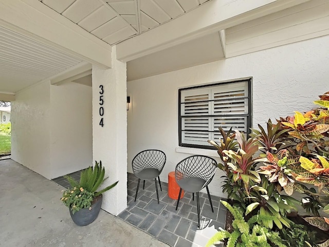 3504 Wedge Way, New Port Richey, FL 34655 - view of exterior entry with stucco siding
