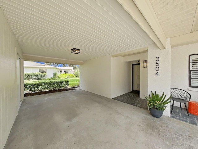 3504 Wedge Way, New Port Richey, FL 34655 - view of patio / terrace with an attached carport