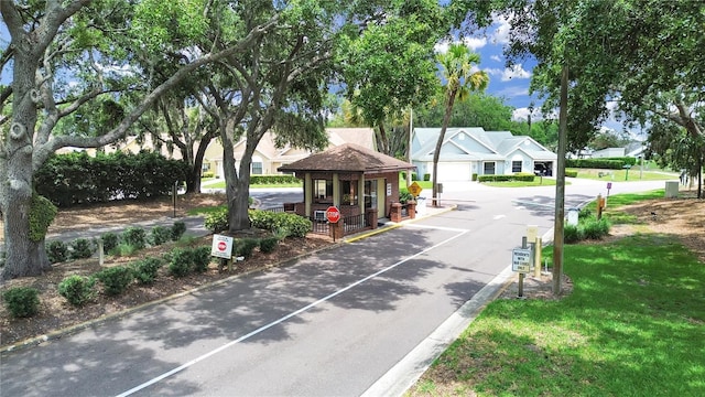 3504 Wedge Way, New Port Richey, FL 34655 - surrounding community featuring driveway, a residential view, and a lawn