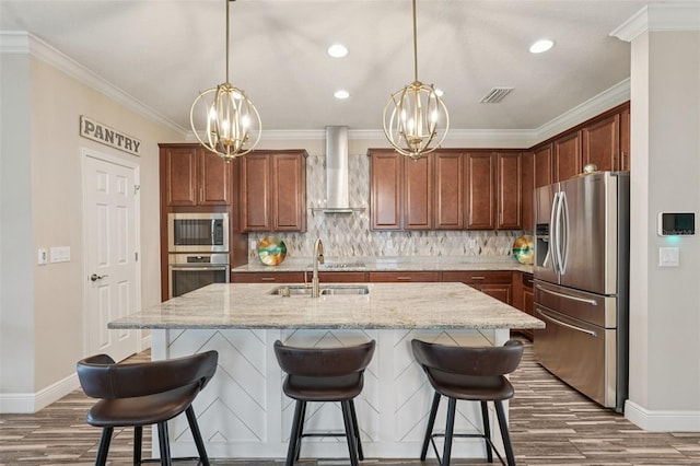 13128 Foxtail Fern Dr, Riverview, FL 33579 - kitchen featuring stainless steel appliances, wall chimney exhaust hood, a chandelier, dark wood-style flooring, and ornamental molding
