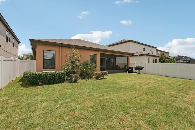 13128 Foxtail Fern Dr, Riverview, FL 33579 - back of property featuring stucco siding, a fenced backyard, and a sunroom