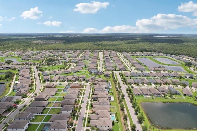 13128 Foxtail Fern Dr, Riverview, FL 33579 - aerial view of residential area featuring a heavily wooded area and a nearby body of water