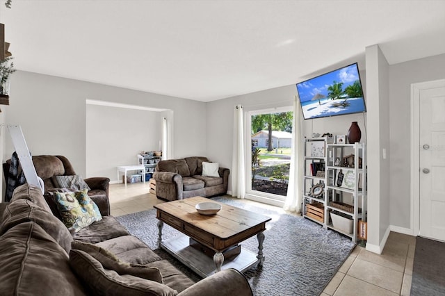 3615 Greatwood Ct, Land O Lakes, FL 34639 - living area with light tile patterned floors and baseboards