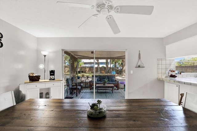 3615 Greatwood Ct, Land O Lakes, FL 34639 - dining room with ceiling fan, plenty of natural light, and wood finished floors