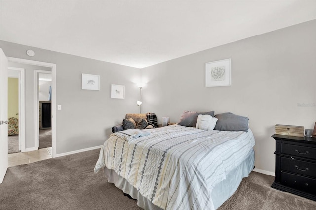 3615 Greatwood Ct, Land O Lakes, FL 34639 - tiled bedroom featuring carpet and baseboards