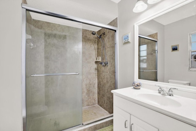 3615 Greatwood Ct, Land O Lakes, FL 34639 - bathroom featuring toilet, a shower stall, and vanity