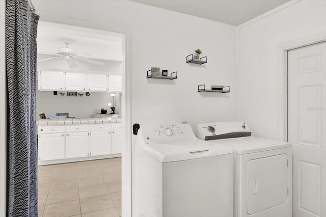 3615 Greatwood Ct, Land O Lakes, FL 34639 - laundry area featuring a ceiling fan, washer and clothes dryer, and light tile patterned floors