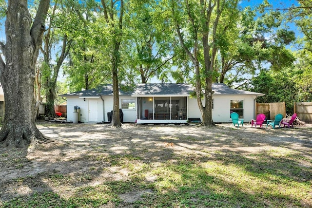 3615 Greatwood Ct, Land O Lakes, FL 34639 - back of property with a sunroom