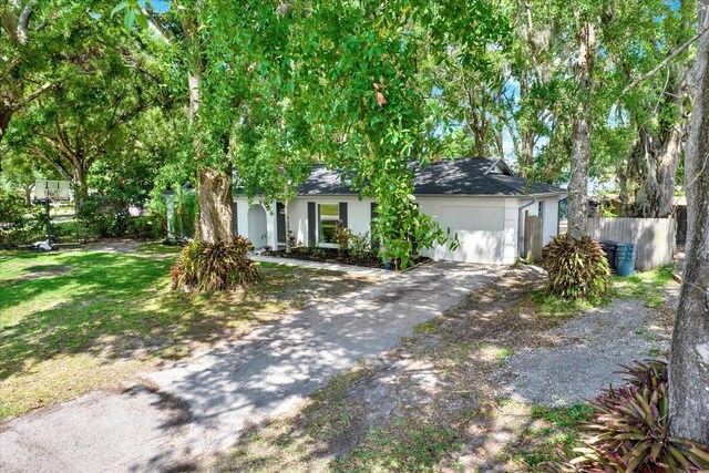 3615 Greatwood Ct, Land O Lakes, FL 34639 - view of front of house with asphalt driveway and stucco siding