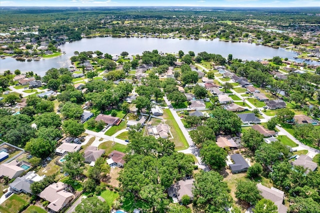 3615 Greatwood Ct, Land O Lakes, FL 34639 - aerial view of property's location featuring a nearby body of water and nearby suburban area