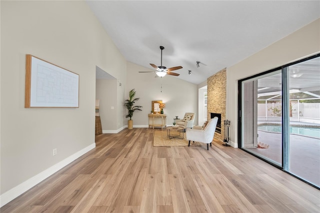 4509 Grainary Ave, Tampa, FL 33624 - sitting room with lofted ceiling, ceiling fan, light wood-style floors, healthy amount of natural light, and baseboards