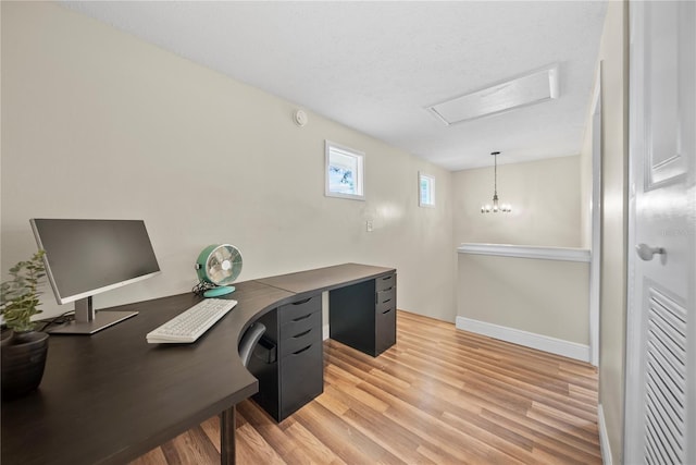 4509 Grainary Ave, Tampa, FL 33624 - office area featuring light wood-type flooring and baseboards