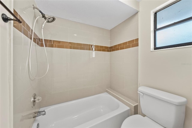 4509 Grainary Ave, Tampa, FL 33624 - bathroom featuring toilet and tub / shower combination