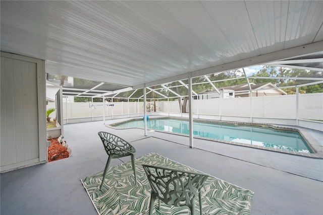 4509 Grainary Ave, Tampa, FL 33624 - view of pool featuring a patio area, a fenced backyard, and a lanai