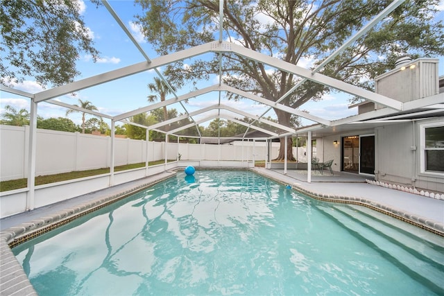4509 Grainary Ave, Tampa, FL 33624 - view of pool featuring a patio, a fenced backyard, and a lanai