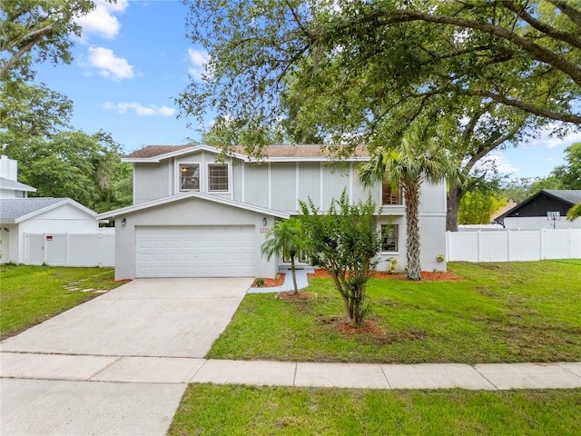 4509 Grainary Ave, Tampa, FL 33624 - view of front of property featuring an attached garage and concrete driveway