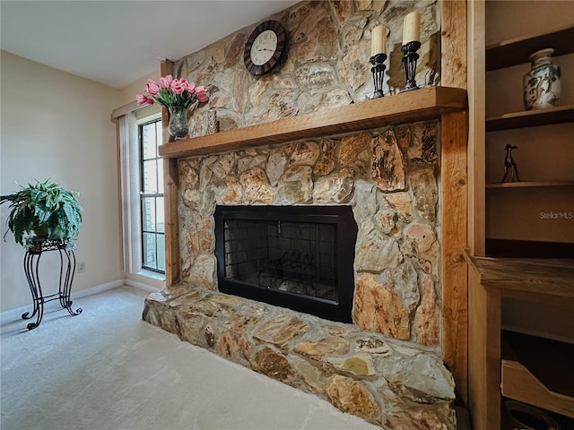 5004 Grainary Ave, Tampa, FL 33624 - detailed view of carpet floors, a stone fireplace, and baseboards