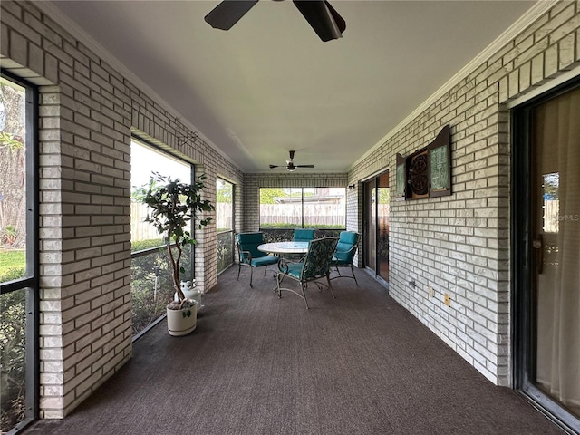 5004 Grainary Ave, Tampa, FL 33624 - sunroom with a ceiling fan