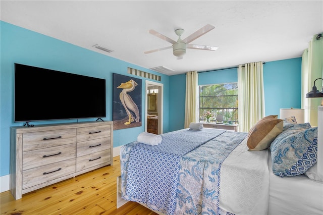 4916 Palmetto Point Dr, Palmetto, FL 34221 - bedroom featuring light wood-style flooring and a ceiling fan