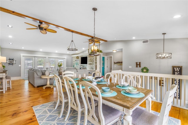 4916 Palmetto Point Dr, Palmetto, FL 34221 - dining room featuring lofted ceiling, a ceiling fan, light wood-style floors, and recessed lighting