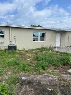 3074 NE Garden Ter, Palm Bay, FL 32905 - view of home's exterior with stucco siding