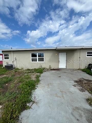 3074 NE Garden Ter, Palm Bay, FL 32905 - view of front of house featuring stucco siding
