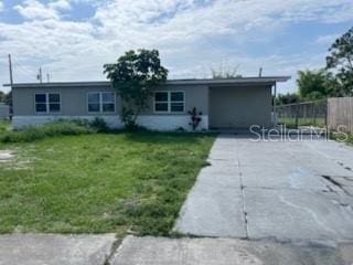 3074 NE Garden Ter, Palm Bay, FL 32905 - view of front facade with driveway