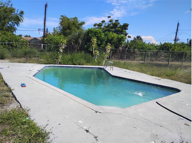 3074 NE Garden Ter, Palm Bay, FL 32905 - view of pool with a patio area