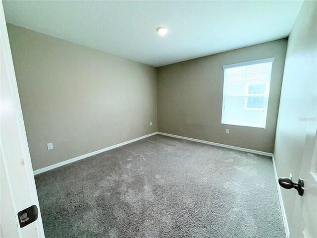 13118 Zolo Springs Cir, Riverview, FL 33579 - carpeted empty room featuring baseboards
