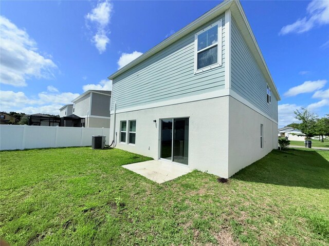 13118 Zolo Springs Cir, Riverview, FL 33579 - rear view of house featuring cooling unit and stucco siding