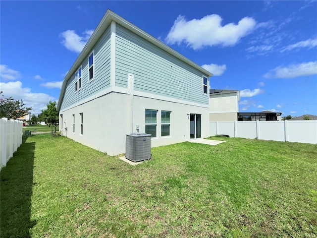 13118 Zolo Springs Cir, Riverview, FL 33579 - back of property with central air condition unit and stucco siding