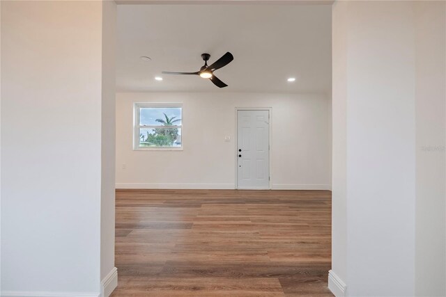 410 Virginia Ave, Madeira Beach, FL 33708 - empty room with light wood-type flooring, recessed lighting, ceiling fan, and baseboards
