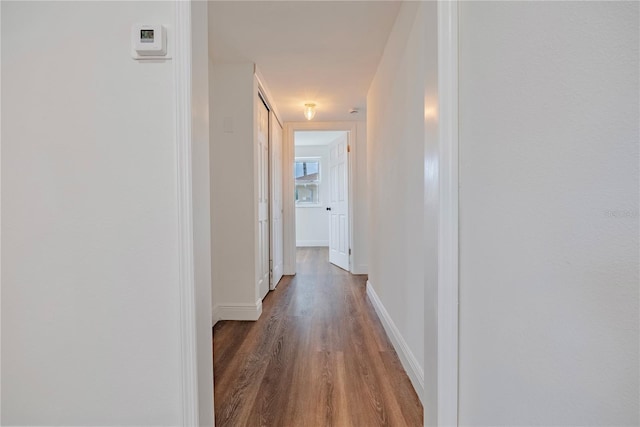 410 Virginia Ave, Madeira Beach, FL 33708 - hall with wood finished floors and baseboards