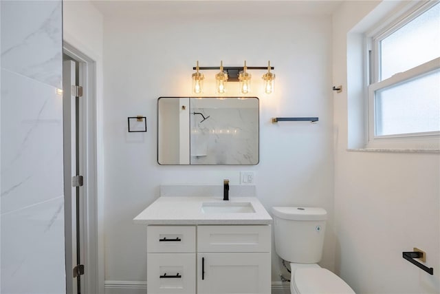 410 Virginia Ave, Madeira Beach, FL 33708 - full bath featuring vanity, toilet, and a marble finish shower