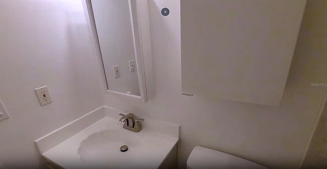 3513 Danny Bryan Blvd, Tampa, FL 33619 - half bathroom with vanity and toilet