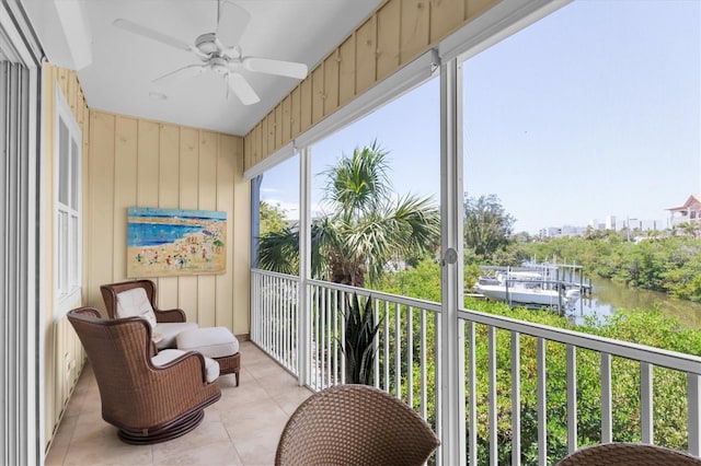 204 Haven Beach Ct, Indian Rocks Beach, FL 33785 - sunroom / solarium featuring a ceiling fan and a water view