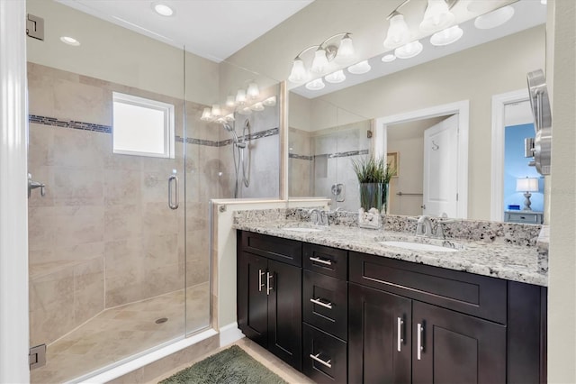 204 Haven Beach Ct, Indian Rocks Beach, FL 33785 - bathroom with double vanity and a shower stall