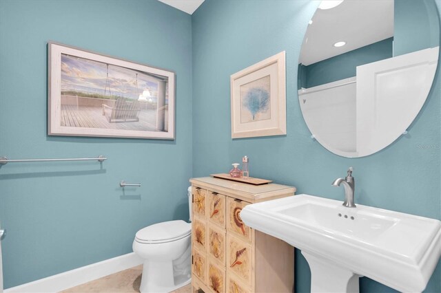 204 Haven Beach Ct, Indian Rocks Beach, FL 33785 - bathroom with a sink and toilet