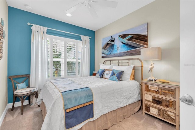 204 Haven Beach Ct, Indian Rocks Beach, FL 33785 - carpeted bedroom with baseboards and ceiling fan
