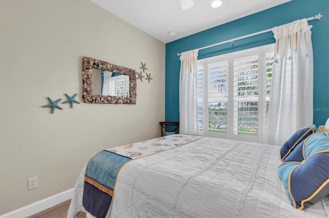 204 Haven Beach Ct, Indian Rocks Beach, FL 33785 - bedroom with carpet flooring and a ceiling fan