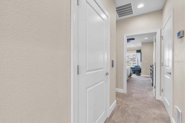 204 Haven Beach Ct, Indian Rocks Beach, FL 33785 - hallway with light carpet and recessed lighting