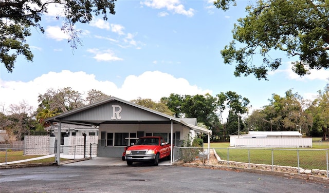 38819 Otis Allen Rd, Zephyrhills, FL 33540 - view of front facade with asphalt driveway, brick siding, and an attached carport