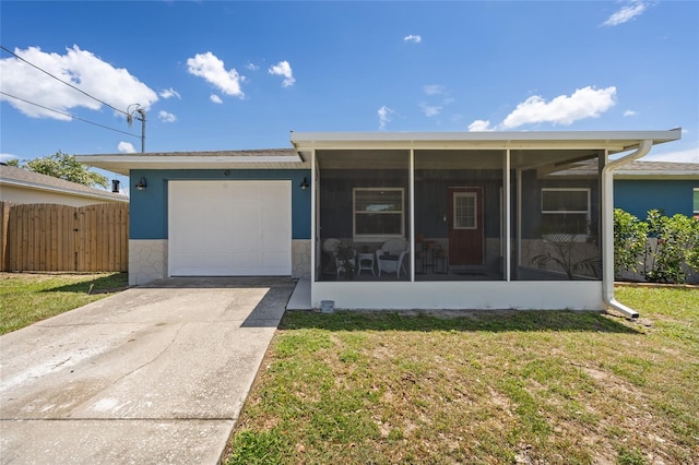 3983 Shay Dr, Bartow, FL 33830 - single story home featuring a sunroom, an attached garage, concrete driveway, and a gate