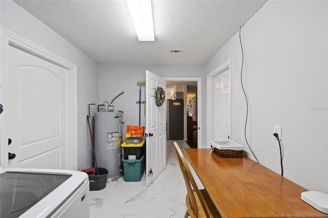 3983 Shay Dr, Bartow, FL 33830 - interior space featuring electric water heater, light marble finish flooring, and a textured ceiling