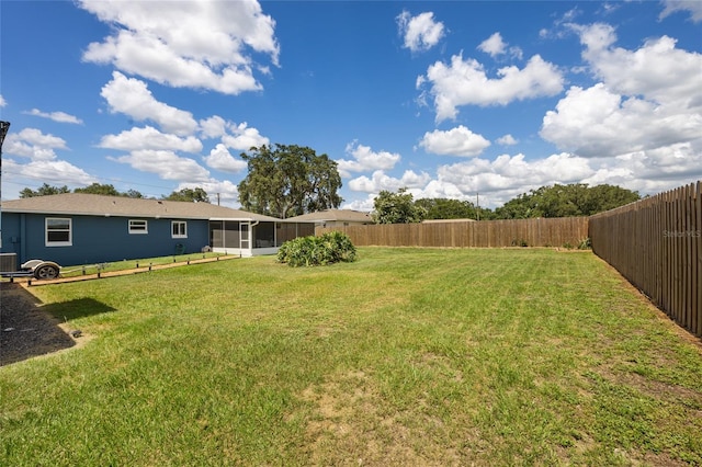 3983 Shay Dr, Bartow, FL 33830 - fenced backyard with a sunroom