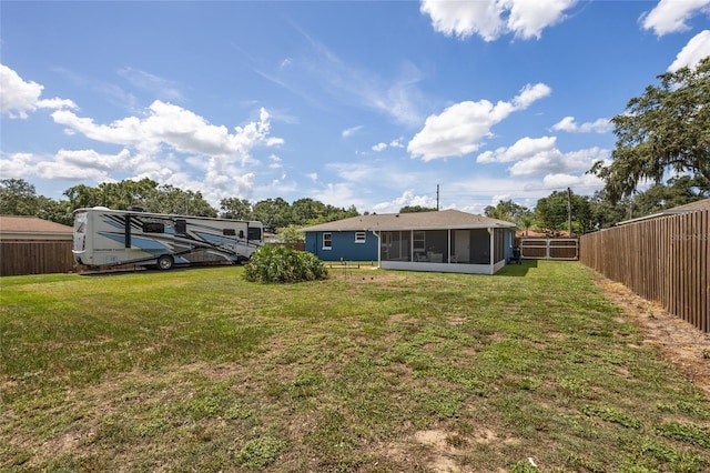3983 Shay Dr, Bartow, FL 33830 - fenced backyard featuring a sunroom